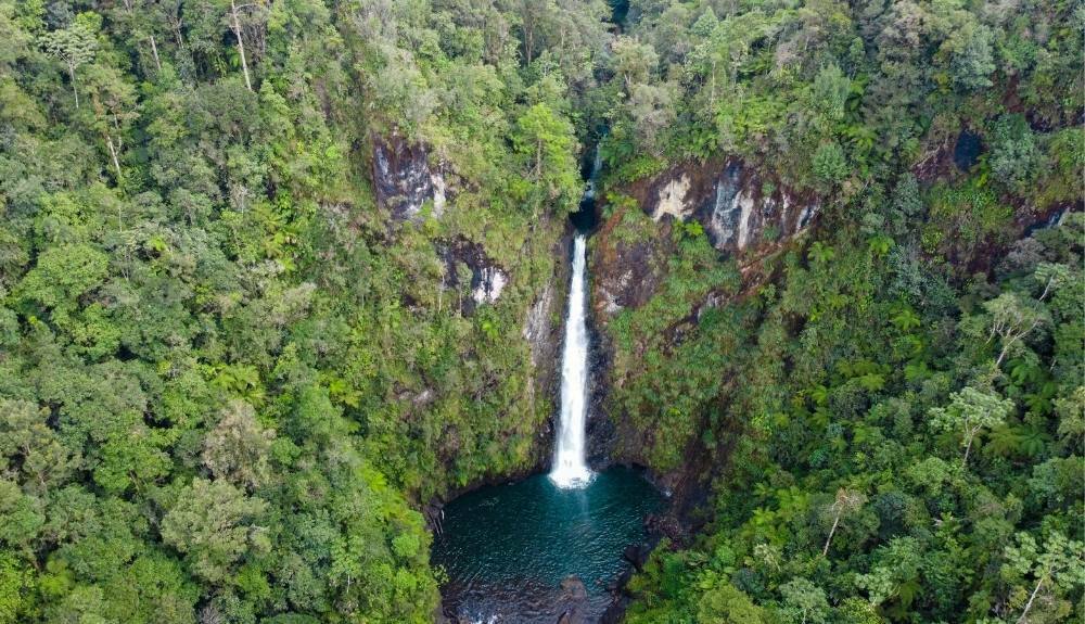 Beautiful Rubel Chaim Waterfall in Guatemala, one of the most beautiful places in Guatemala, is pictured falling 200 feet from a cliff in the middle of a green mountain forest in Ram Tzul Nature Reserve in Purulha Guatemala