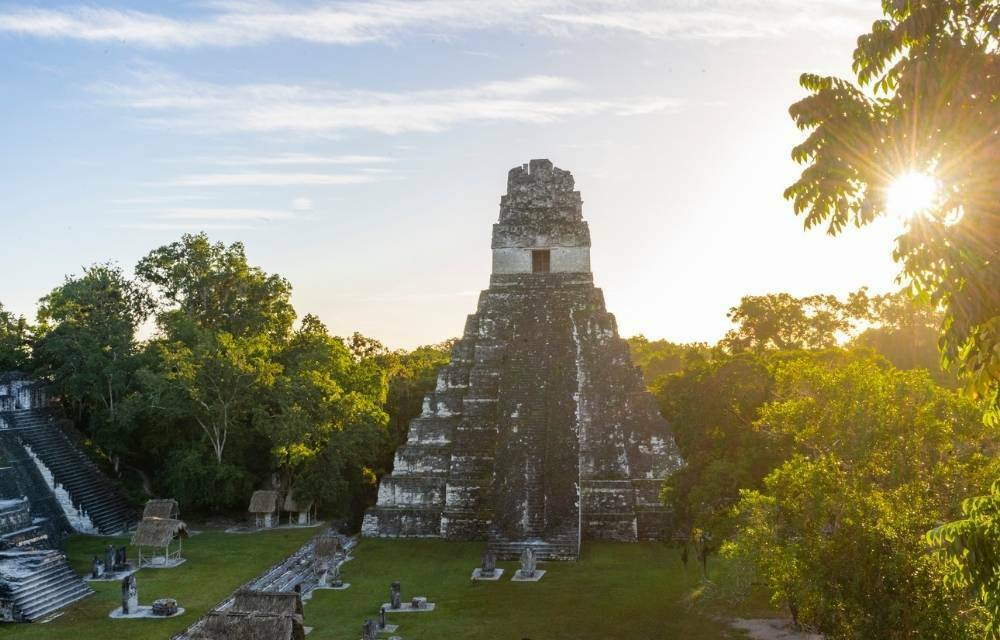 Temple of the Great Jaguar at Tikal National Park in Guatemala shown at sunrise